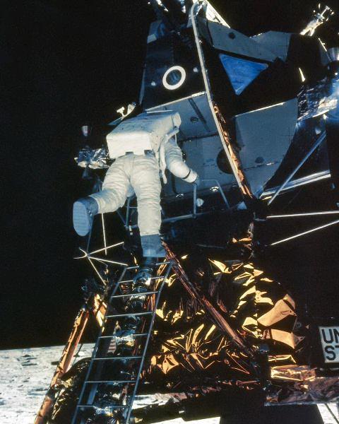 Astronaut descends ladder from LEM to lunar surface. (NASA photo)